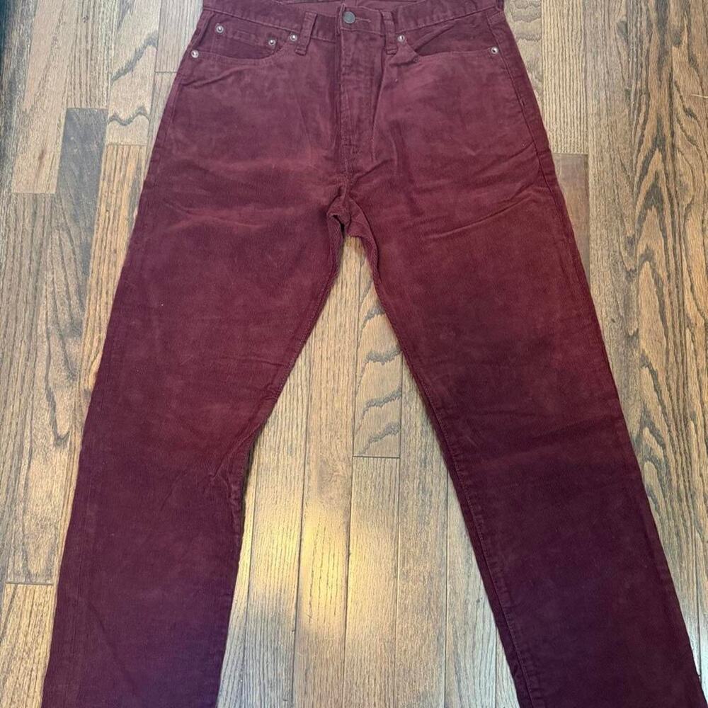Burgundy corduroy straight leg pants in a 31